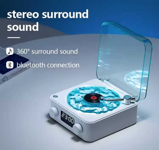 Waves Retro Vinyl Bluetooth Speaker with clock display.
